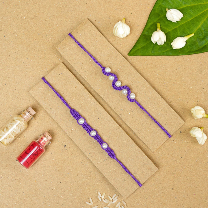 Handmade Macrame Beaded Rakhi With Roli Chawal Set Of 2 1 - Purple rakhis with gift pack
