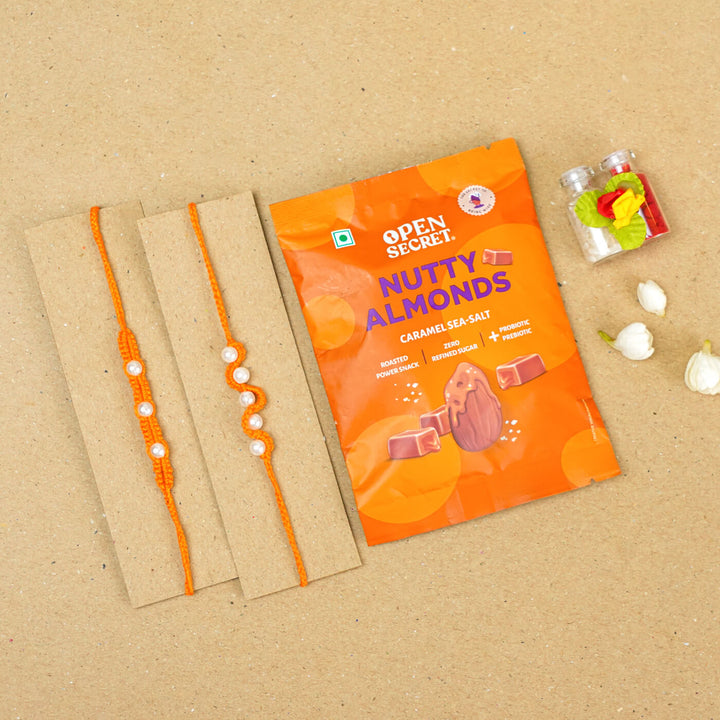 Handmade Macrame Beaded Rakhi With Roli Chawal Set Of 2 1 - Orange rakhis with gift pack