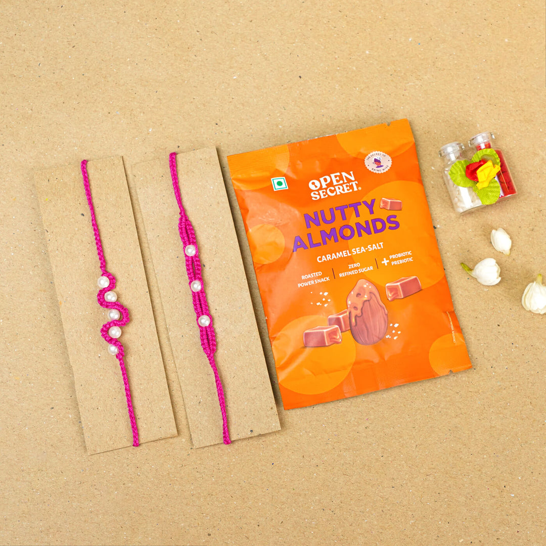 Handmade Macrame Beaded Rakhi With Roli Chawal Set Of 2 1 - Pink rakhis with gift pack