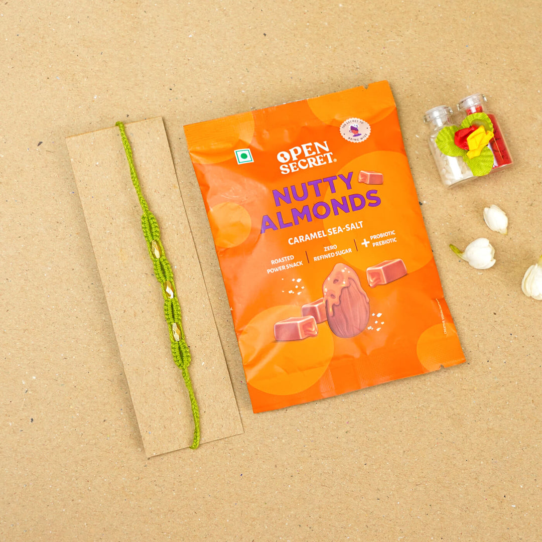 Handmade Macrame Three Gold Beaded Rakhi With Roli Chawal - Displayed on Card with Packaged Snack (9)