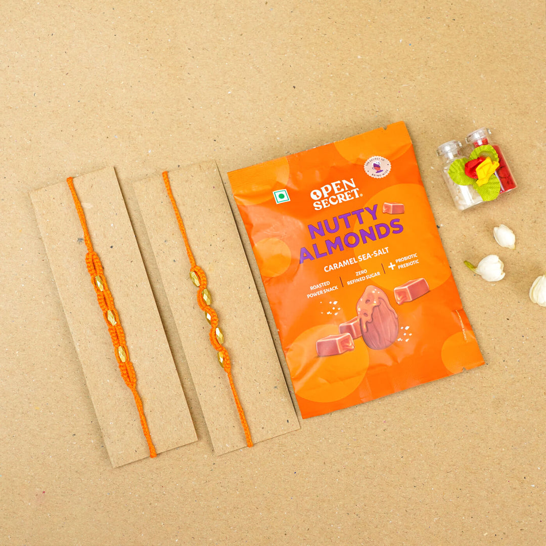 Handmade Macrame Beaded Rakhi With Roli Chawal Set Of 2 - Orange pair with packaging