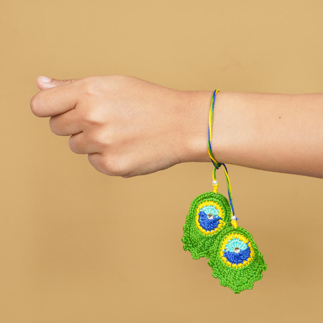 Handmade Crochet Peacock Feather Cotton Lumba Rakhi For Bhabhi With Roli Chawal - Worn on Wrist