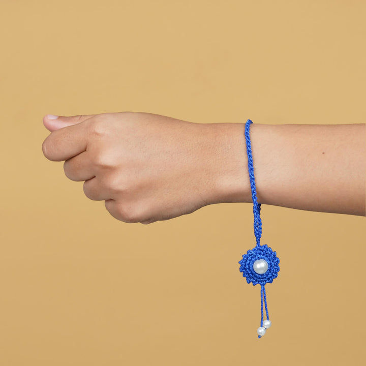 Handmade Crochet Round Pearl Cotton Lumba Rakhi For Bhabhi With Roli Chawal - Worn on wrist