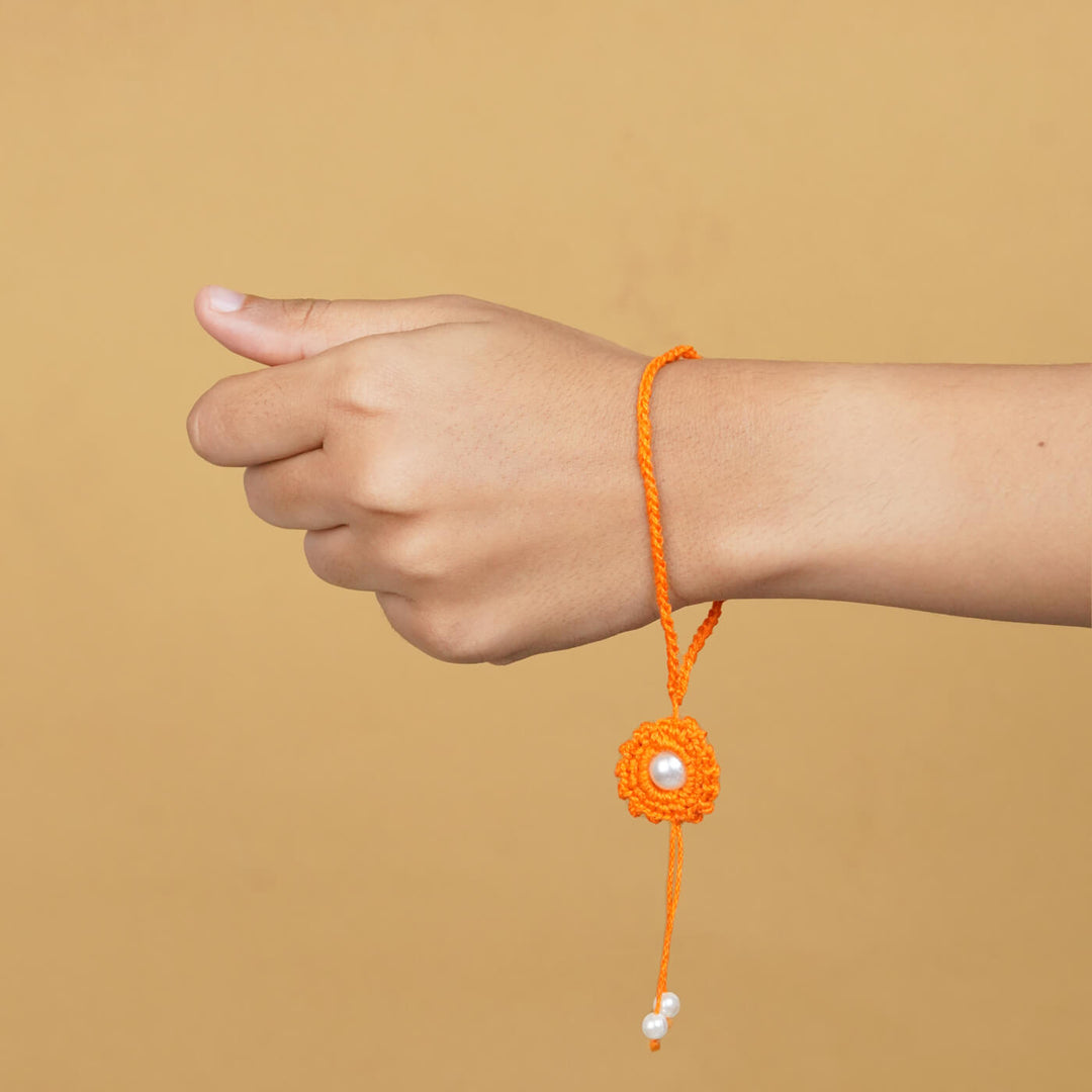 Handmade Crochet Round Pearl Cotton Lumba Rakhi For Bhabhi With Roli Chawal - Worn on wrist (11)