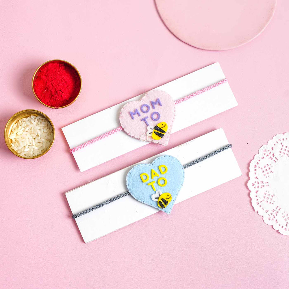 Personalized Handmade Felt Mom Dad To Be Rakhi With Roli Chawal Set Of 2 - Styled with Ceremony Items