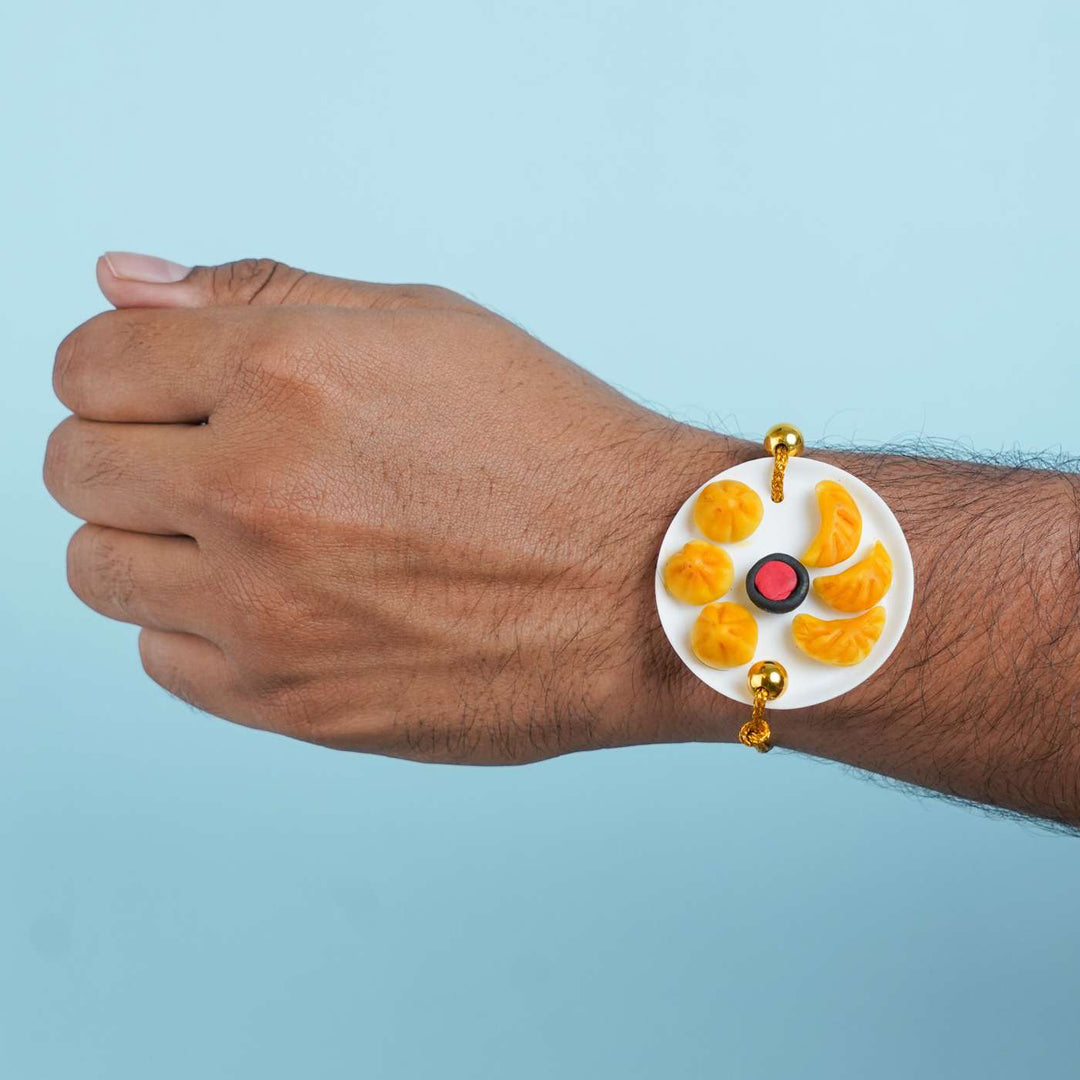 Handmade Miniature Clay Momos Rakhi With Roli Chawal - Worn on Wrist