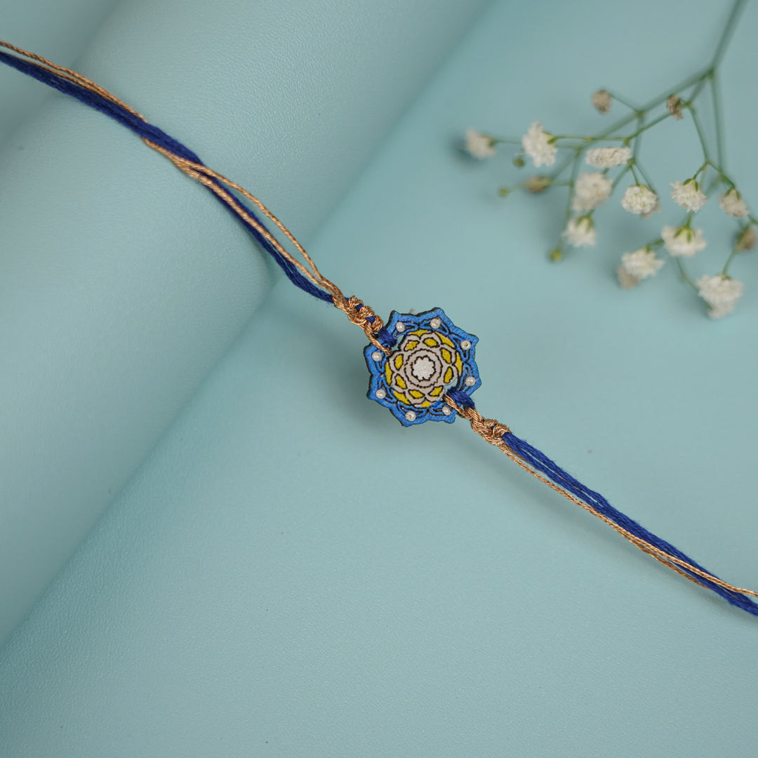 Handmade Blue Jaipuri Ghungroo And Shell Wooden Bhaiya Bhabhi Rakhi With Roli Chawal - Single Bracelet Straight View