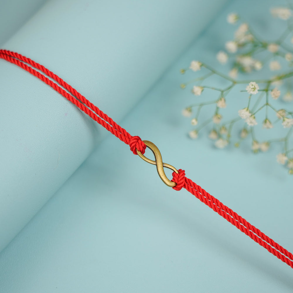 Handmade Minimalist Infinity Rakhi With Roli Chawal - Single Bracelet Close-up