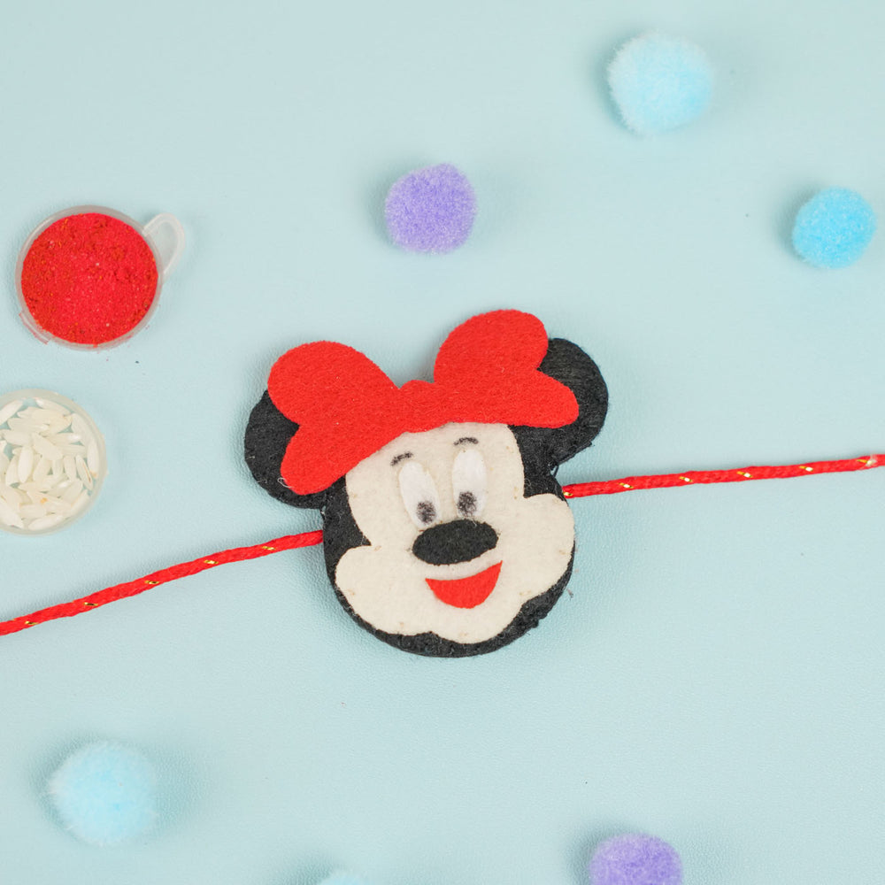 Handmade Beaded Mickey Mouse Theme Pom Pom Felt Rakhi With Roli Chawal For Kids - Front View with Decorative Items