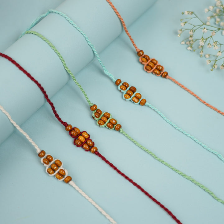 Handmade Beaded Minimalist Rakhi With Roli Chawal - Multiple bracelets in different colors