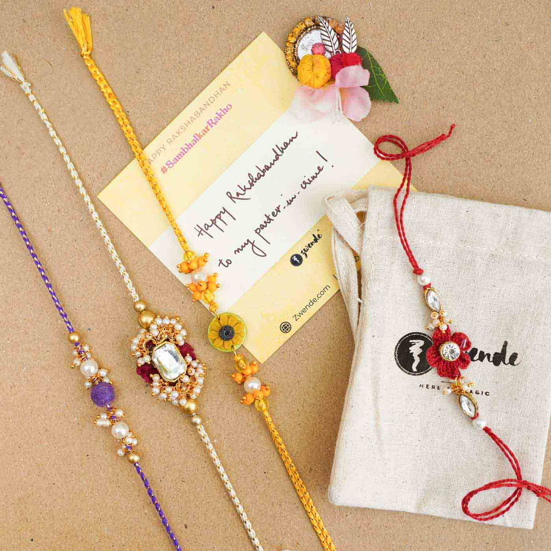 Handmade Kundan Floral Red Rakhi With Roli Chawal - Gift packaging with card and pouch