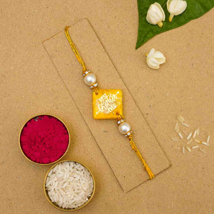 Personalized Handmade Yellow Resin Rakhi With Roli Chawal - Bracelet with Rice and Kumkum