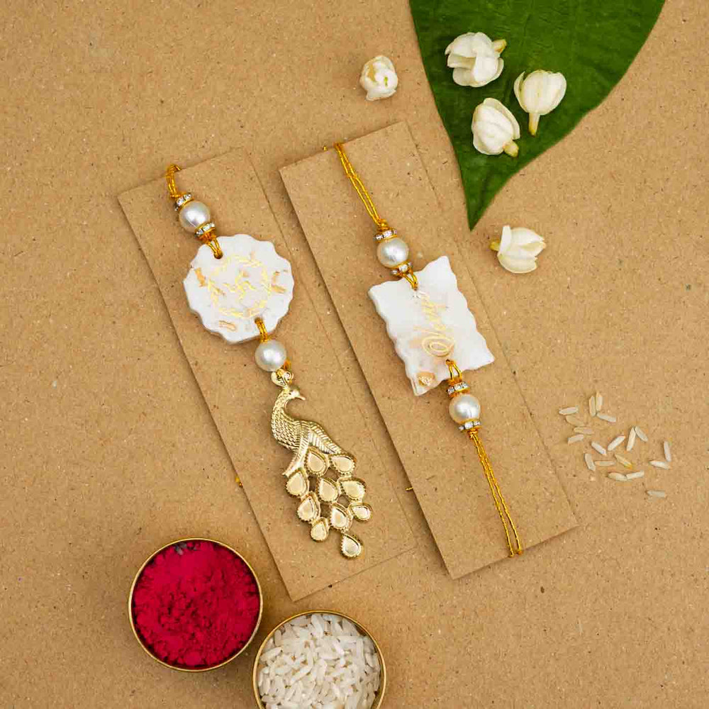 Personalized Handmade White Resin Bhaiya Bhabhi Rakhi With Roli Chawal Set Of 2 - Bracelets on display cards
