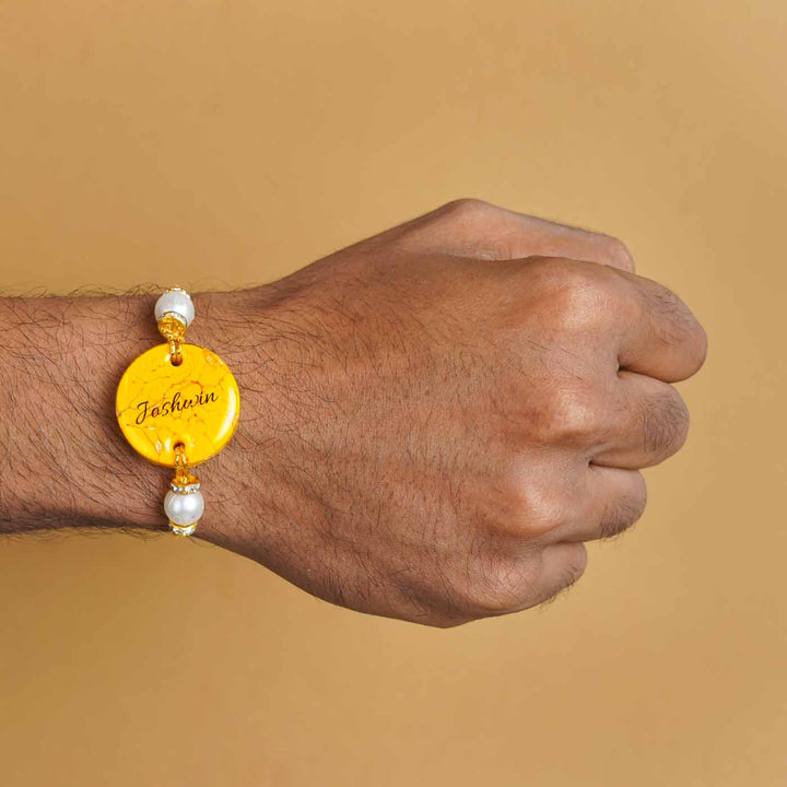 Personalized Handmade Yellow Resin Rakhi With Roli Chawal - On Hand Wear Display (7)
