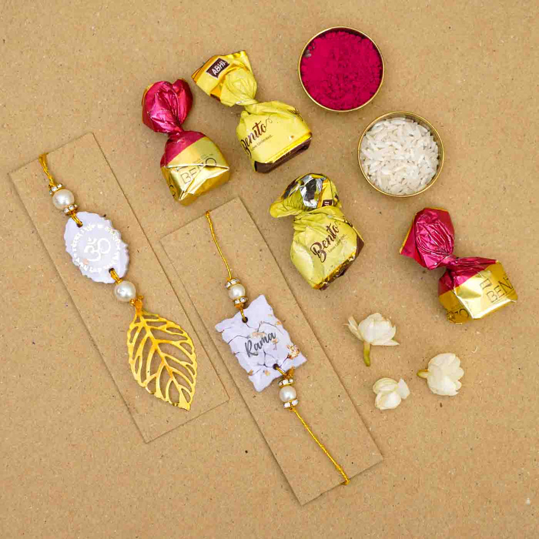 Personalized Handmade Lavendar Resin Bhaiya Bhabhi Rakhi With Roli Chawal Set Of 2 - Flat Lay with Card and Items