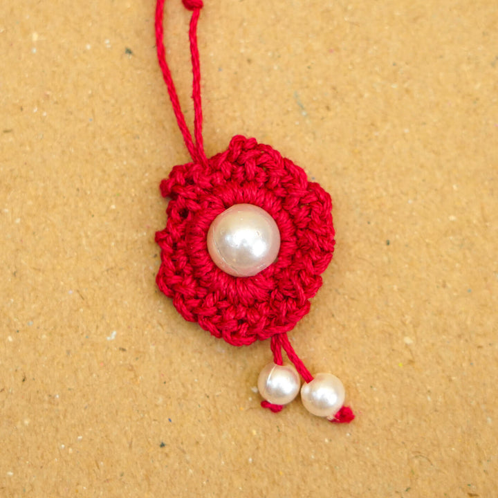 Handmade Crochet Round Pearl Cotton Lumba Rakhi For Bhabhi With Roli Chawal - Close-up of bracelet end detail (16)