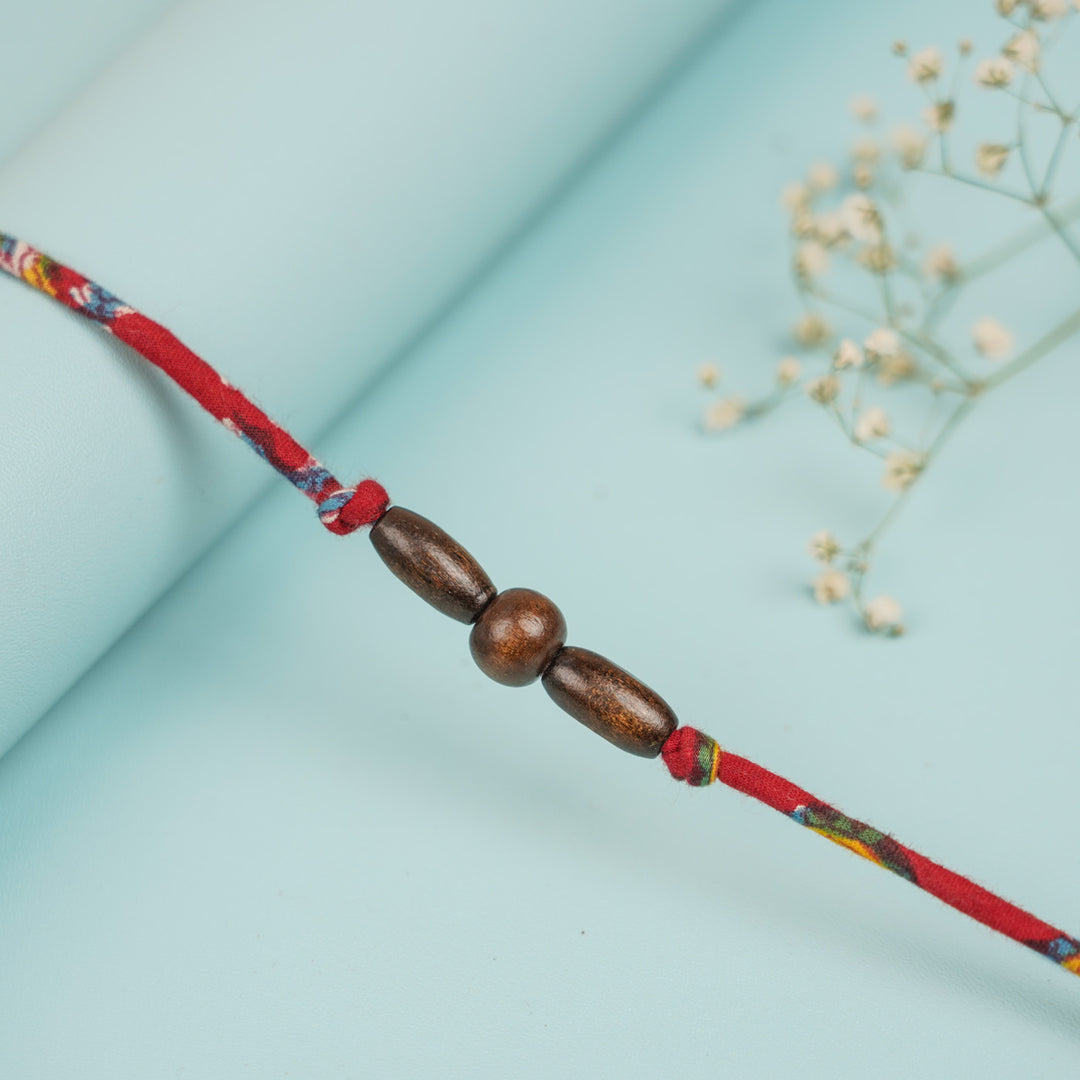 Handmade Beaded Wooden Rakhi For Brother - Bead Detail Close-up