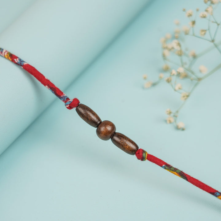 Handmade Beaded Wooden Rakhi For Brother - Bead Detail Close-up