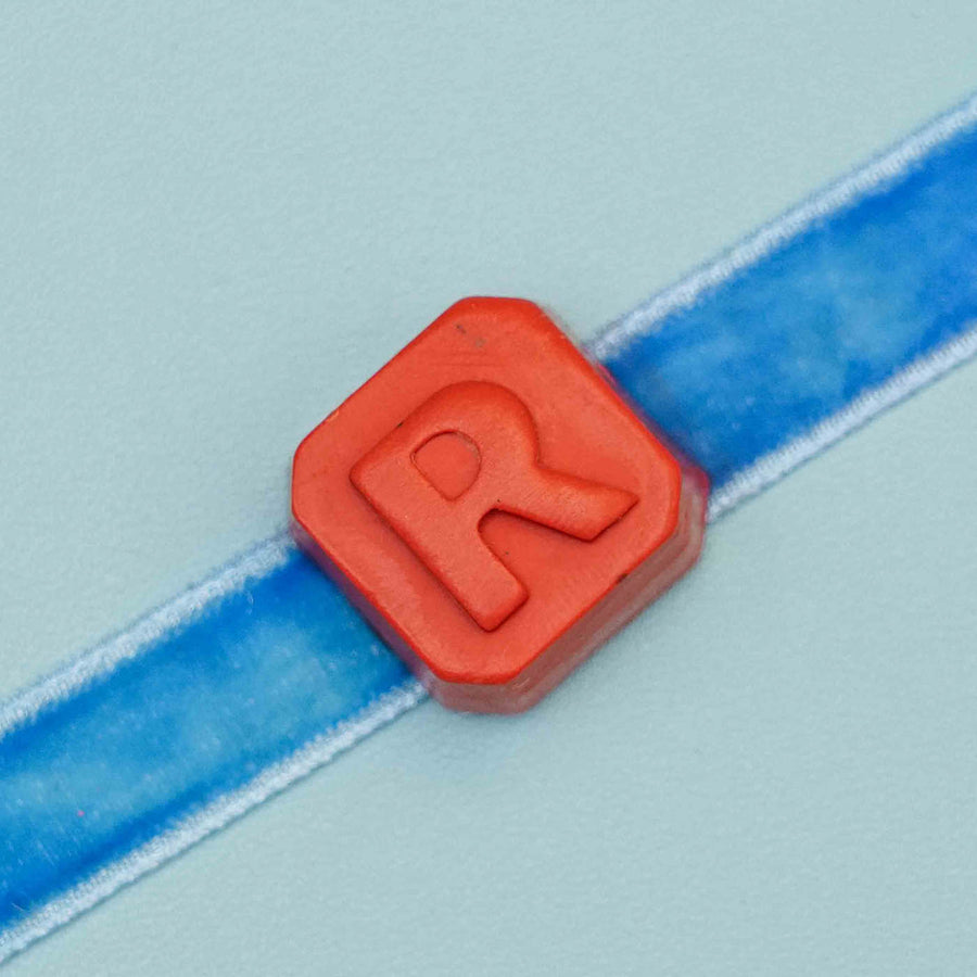Personalized Handmade Name Initials Crayon Kids Rakhi With Roli Chawal - Letter Bead Close-up