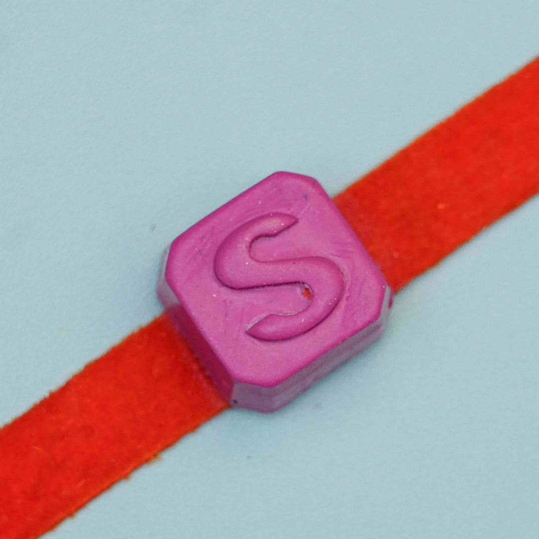 Personalized Handmade Name Initials Crayon Kids Rakhi With Roli Chawal - Letter Bead Close-up (3)