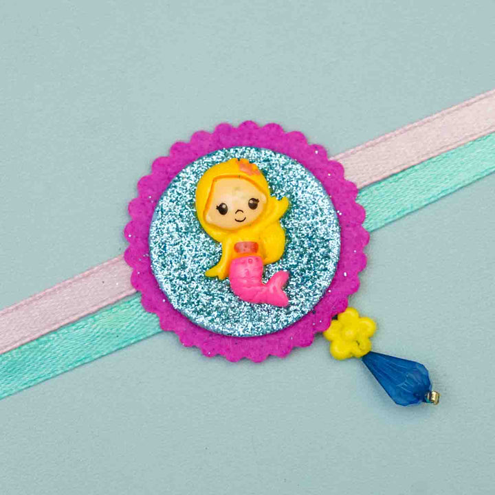 Personalized Handmade Mermaid Theme Felt Kids Rakhi And Name Plate Combo For Sisters Set Of 2 - Close-up of Mermaid Bracelet Detail