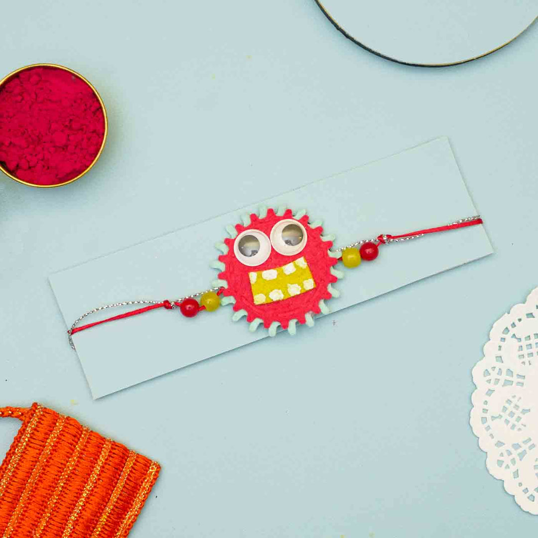 Handmade Monster Theme Felt Kids Rakhi With Roli Chawal - Red Monster Rakhi on Card