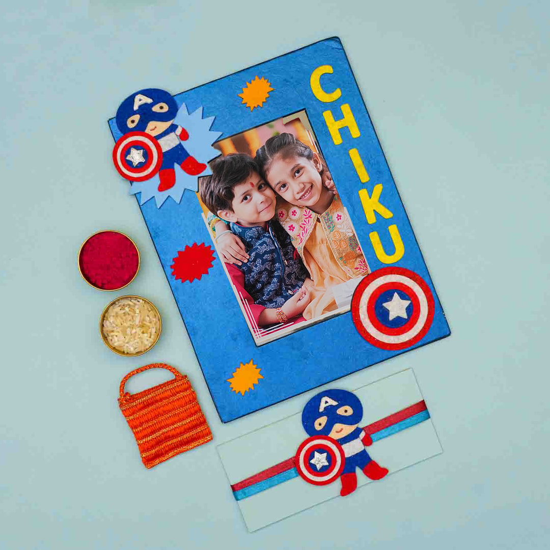 Personalized Handmade Captain America Theme Felt Kids Rakhi And Photo Frame Combo For Brother Set Of 2 - Photo Frame and Rakhi with Festival Items
