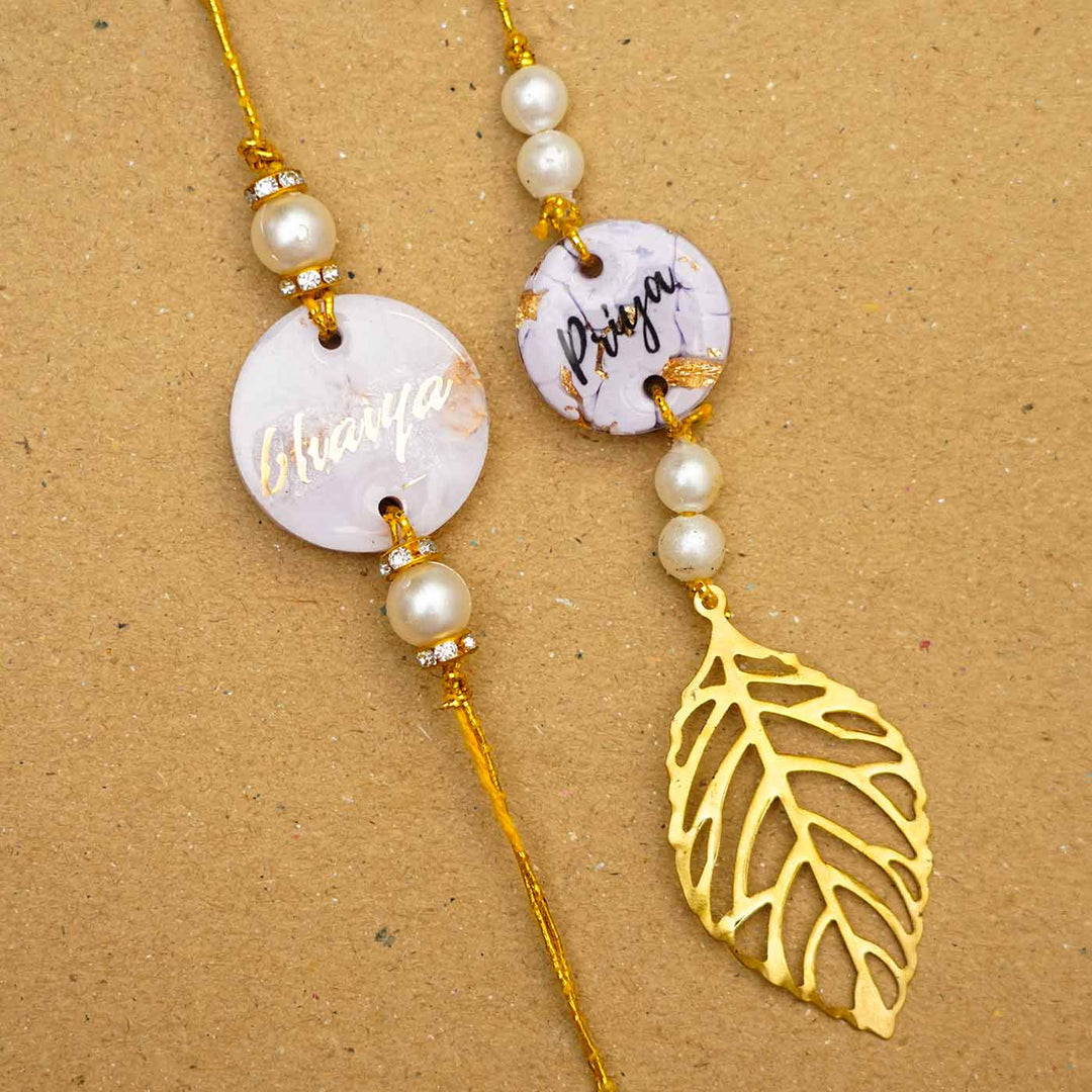 Personalized Handmade Lavendar Resin Bhaiya Bhabhi Rakhi With Roli Chawal Set Of 2 - Close-up Name Personalization Example