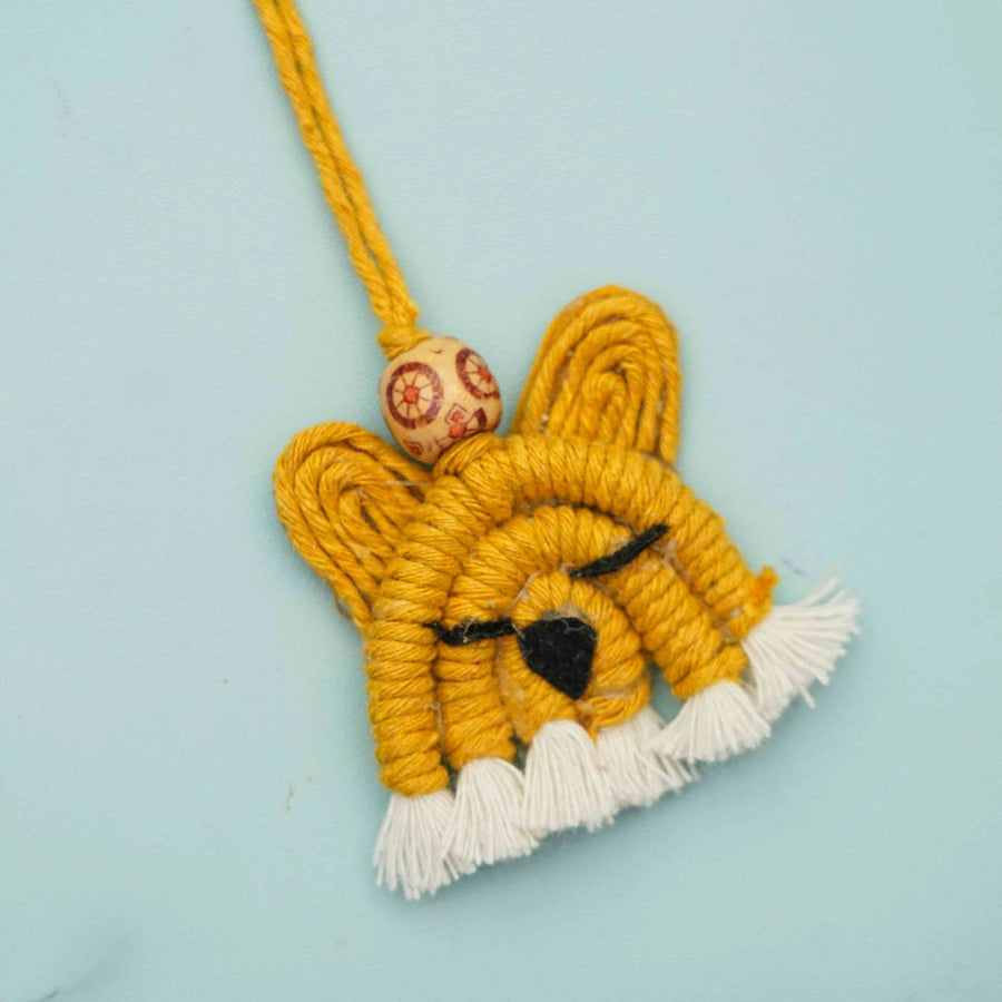 Handmade Macrame Tiger Design Cotton Kids Rakhi For Girls With Chocolates And Roli Chawal - Close-up of single keychain