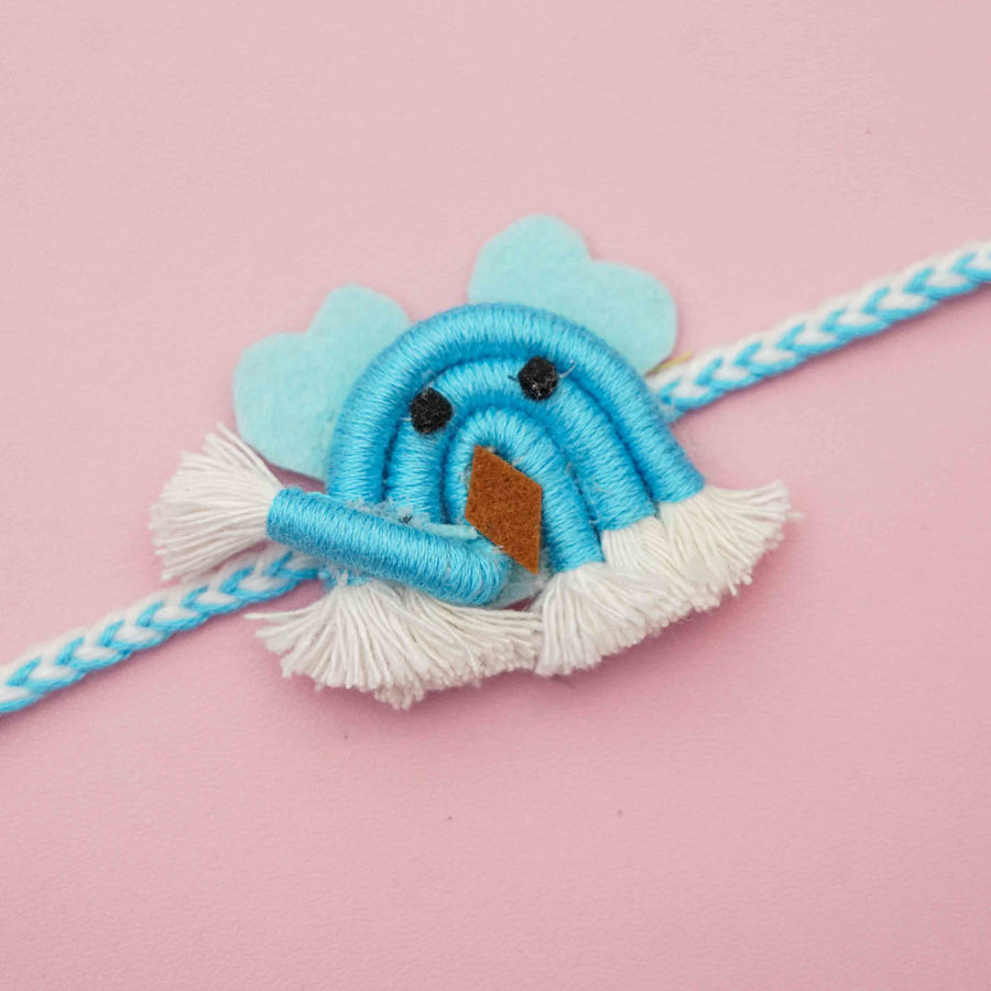 Handmade Macrame Blue Ellie Design Cotton Kids Rakhi With Chocolates And Roli Chawal - Close-up of Single Rakhi
