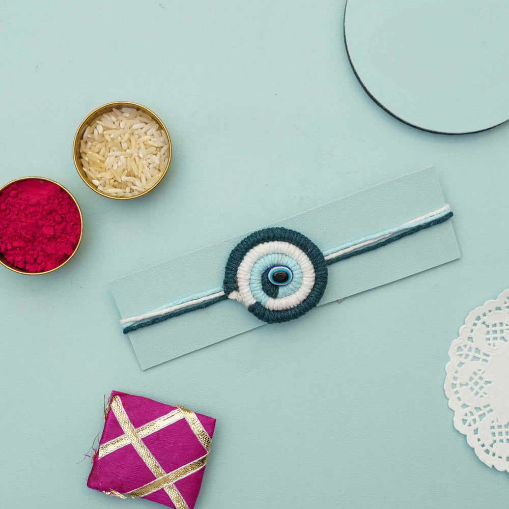 Handmade Macrame Evil Eye Design Cotton Kids Rakhi With Chocolates And Roli Chawal - Rakhi with traditional gifts