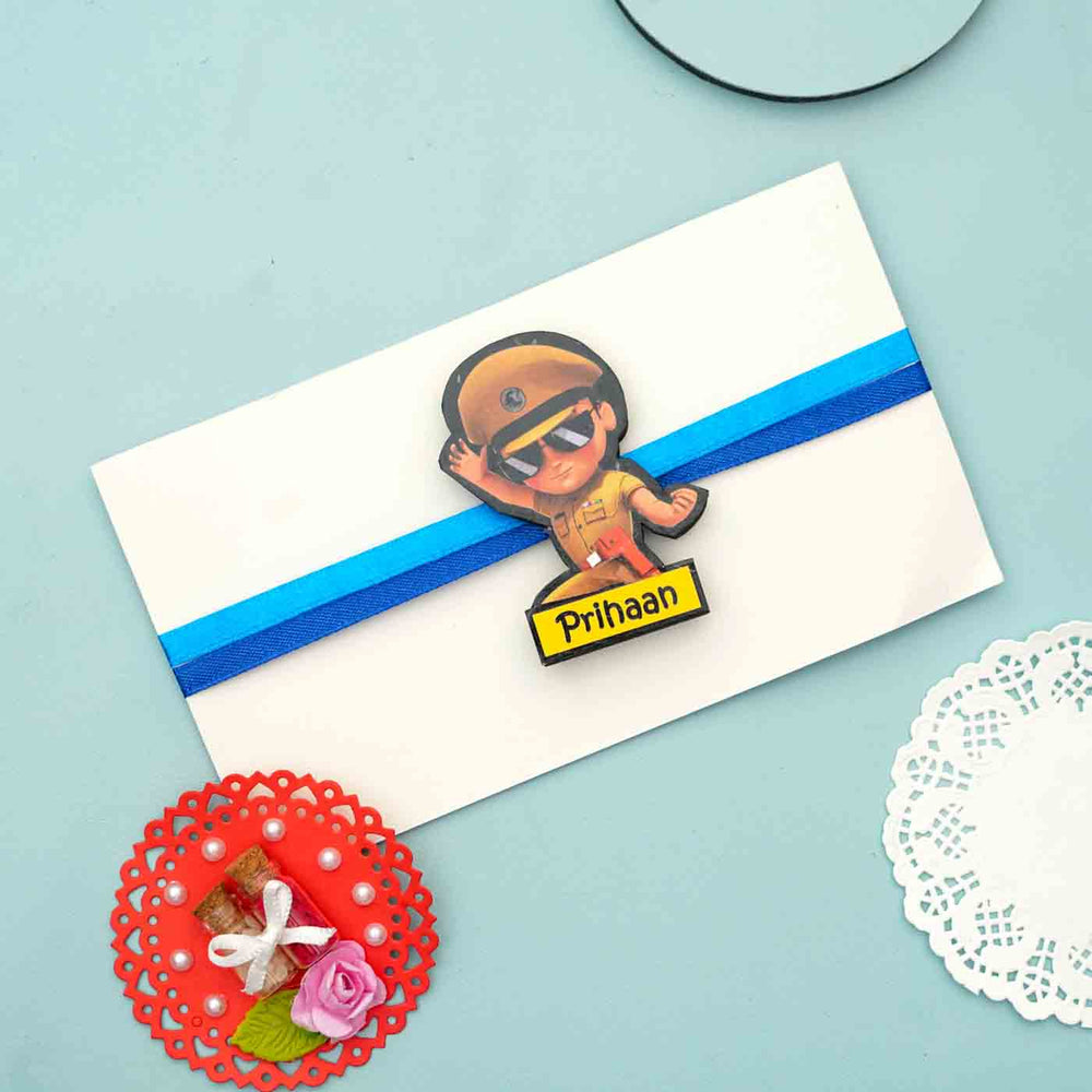 Personalized Reusable X Large Little Singam Mdf Wood Rakhi With Chocolates And Roli Chawal - Badge on Gift Envelope