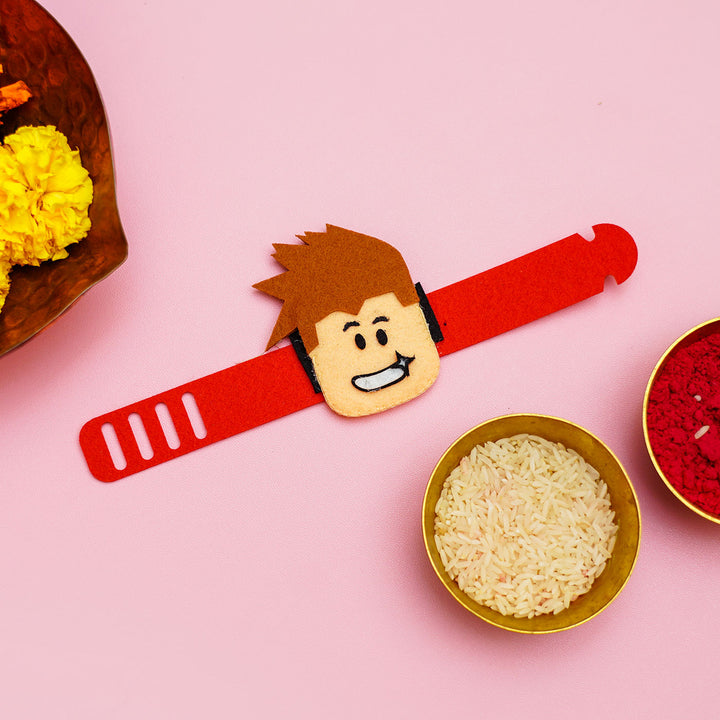 Handcrafted Roblox Felt Rakhi For Kids With Roli Chawal - Flat Lay with Decorative Elements