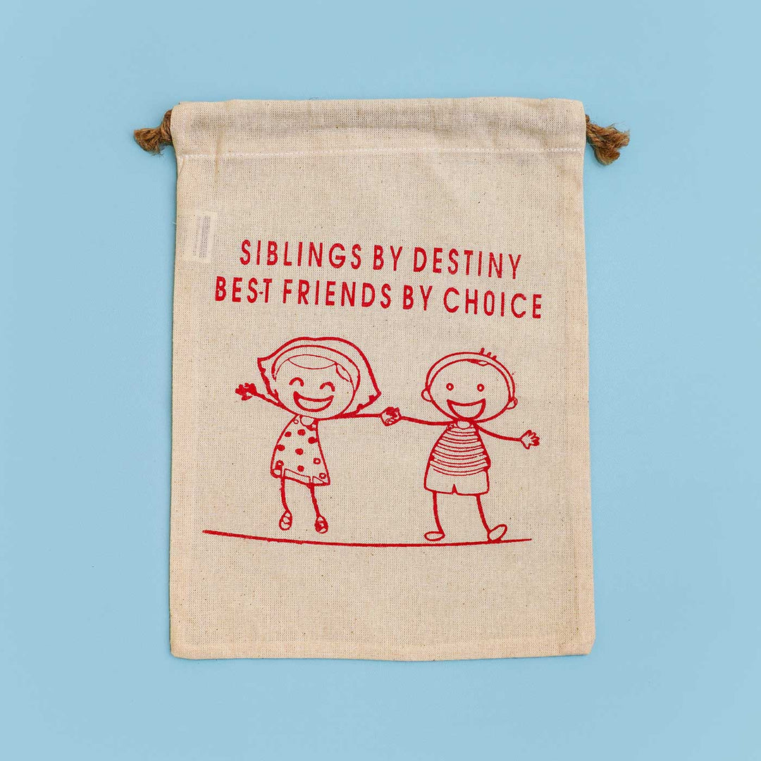 Eco Friendly Fabric Painting Diy Rakhi Hamper With Rice Roli 1 - Front View of Cotton Potli Bag