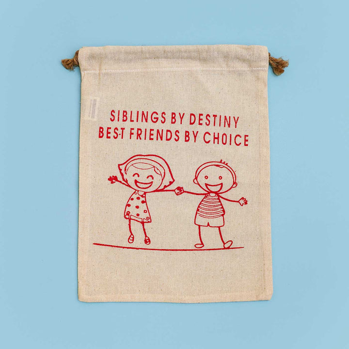 Eco Friendly Fabric Painting Diy Rakhi Hamper With Rice Roli 1 - Front View of Cotton Potli Bag