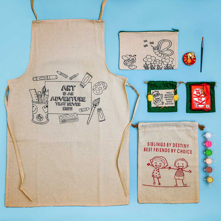 Eco Friendly Fabric Painting Diy Rakhi Hamper With Rice Roli 4 - Canvas Apron and Accessories Flat Lay