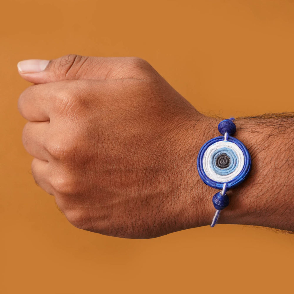 Handmade Ecofriendly Evil Eye Recycled Paper Rakhi With Roli Chawal - Bracelet worn on wrist