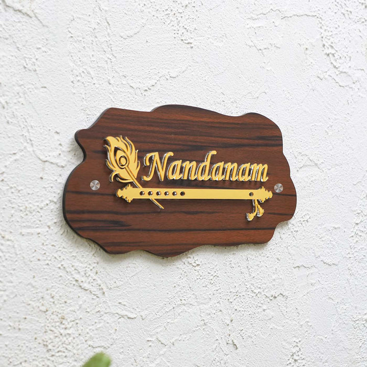 Personalized Weatherproof Golden Flute Acrylic Name Plate - Mounted on Textured White Wall