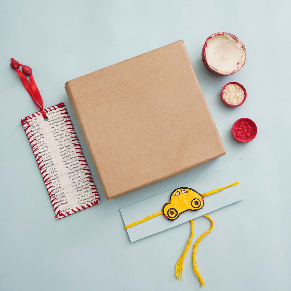 Handmade Ecofriendly Yellow Car Recycled Paper Rakhi With Roli Chawal - Gift Set with Rakhi and Packaging