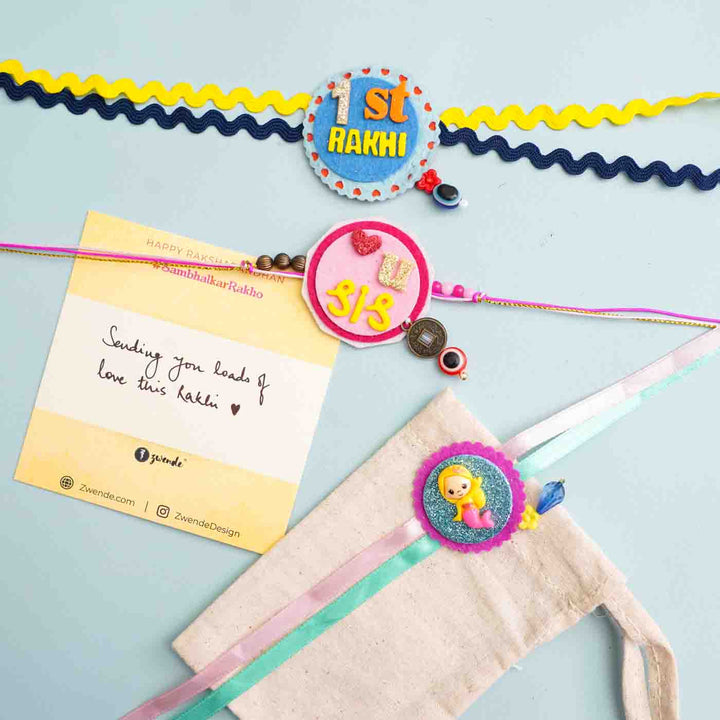 Personalized Handmade Princess Theme Felt Kids Rakhi And Sling Bag Combo For Sisters Set Of 2 - Rakhi with Note and Packaging Elements