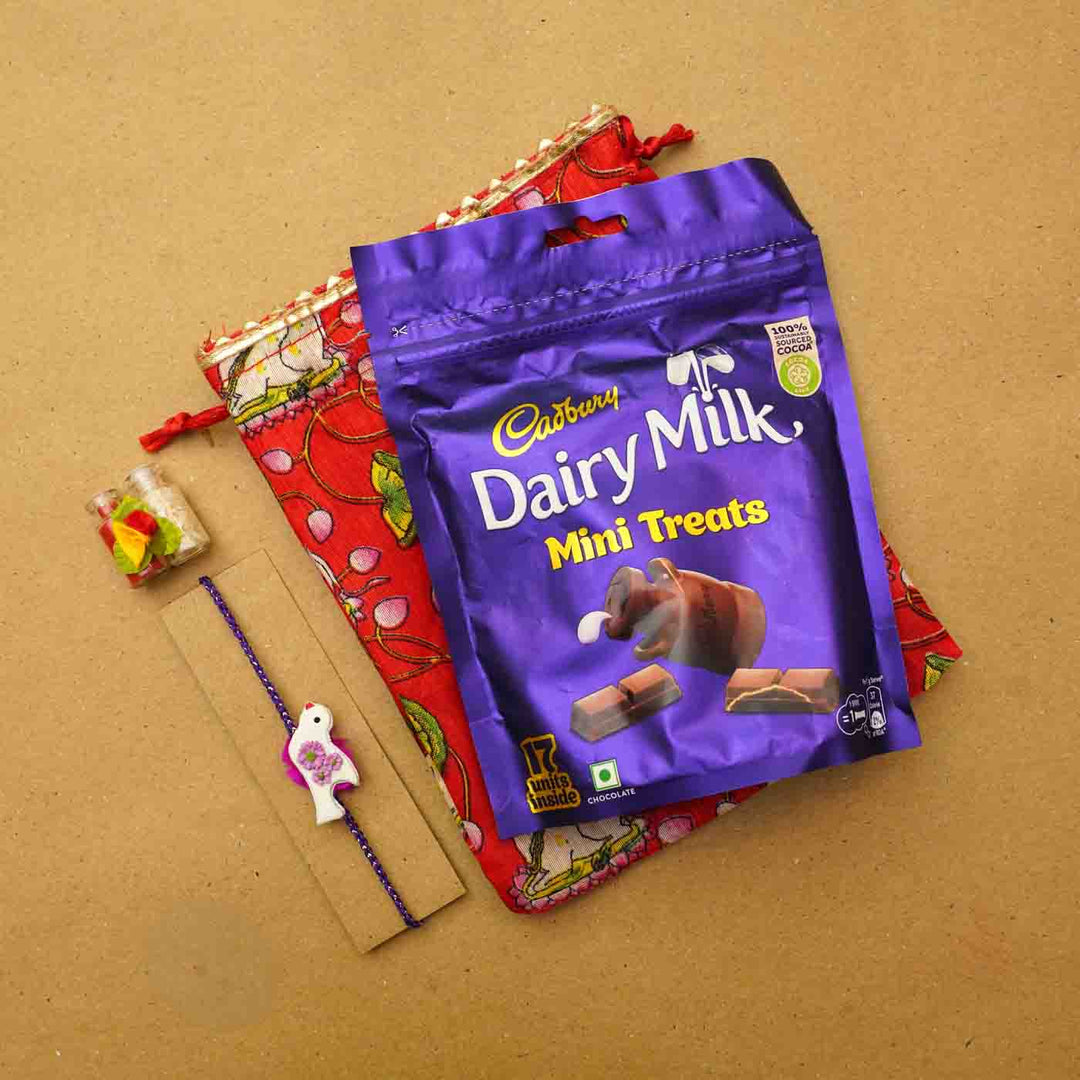 Handmade Bird Clay Rakhi With Chocolates Roli Chawal - Gift bundle with pouch and chocolate