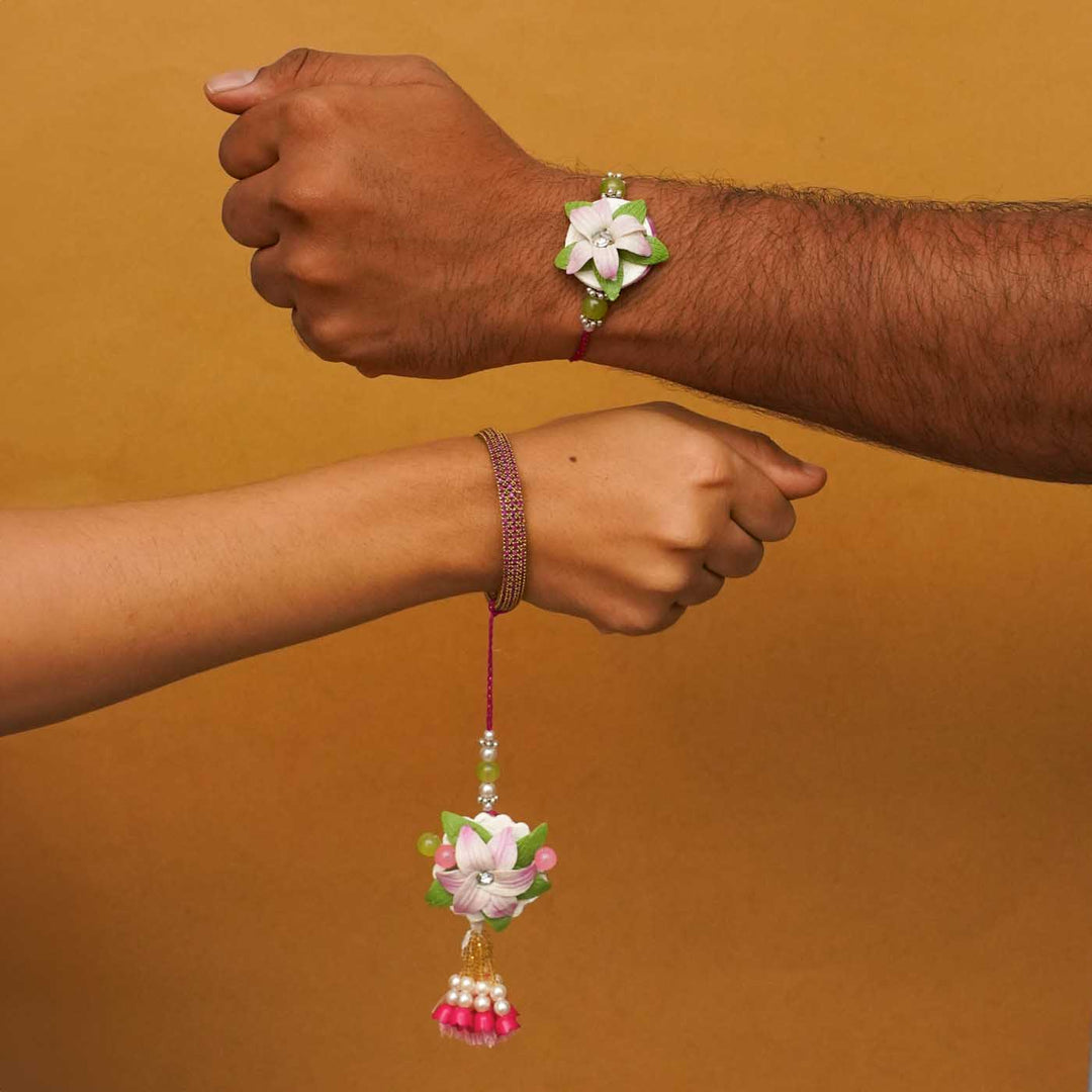 Handmade Lily Clay Bhaiya Bhabhi Rakhi With Chocolates And Roli Chawal Set Of 2 - Worn on Wrists Showing Size