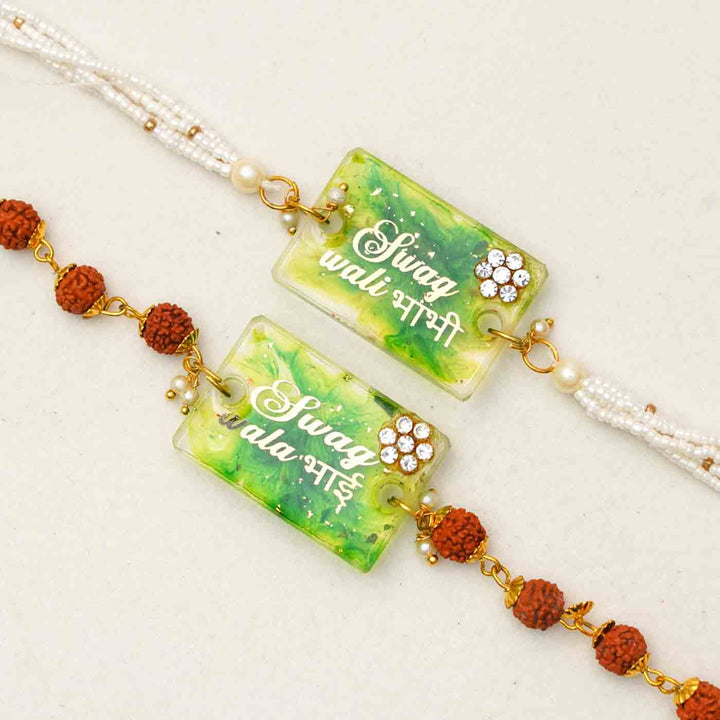Handmade Resin Swag Wala Bhai And Swag Wali Bhabhi Rakhi With Chocolates And Roli Chawal Set Of 2 - Close-up of rakhi pair details