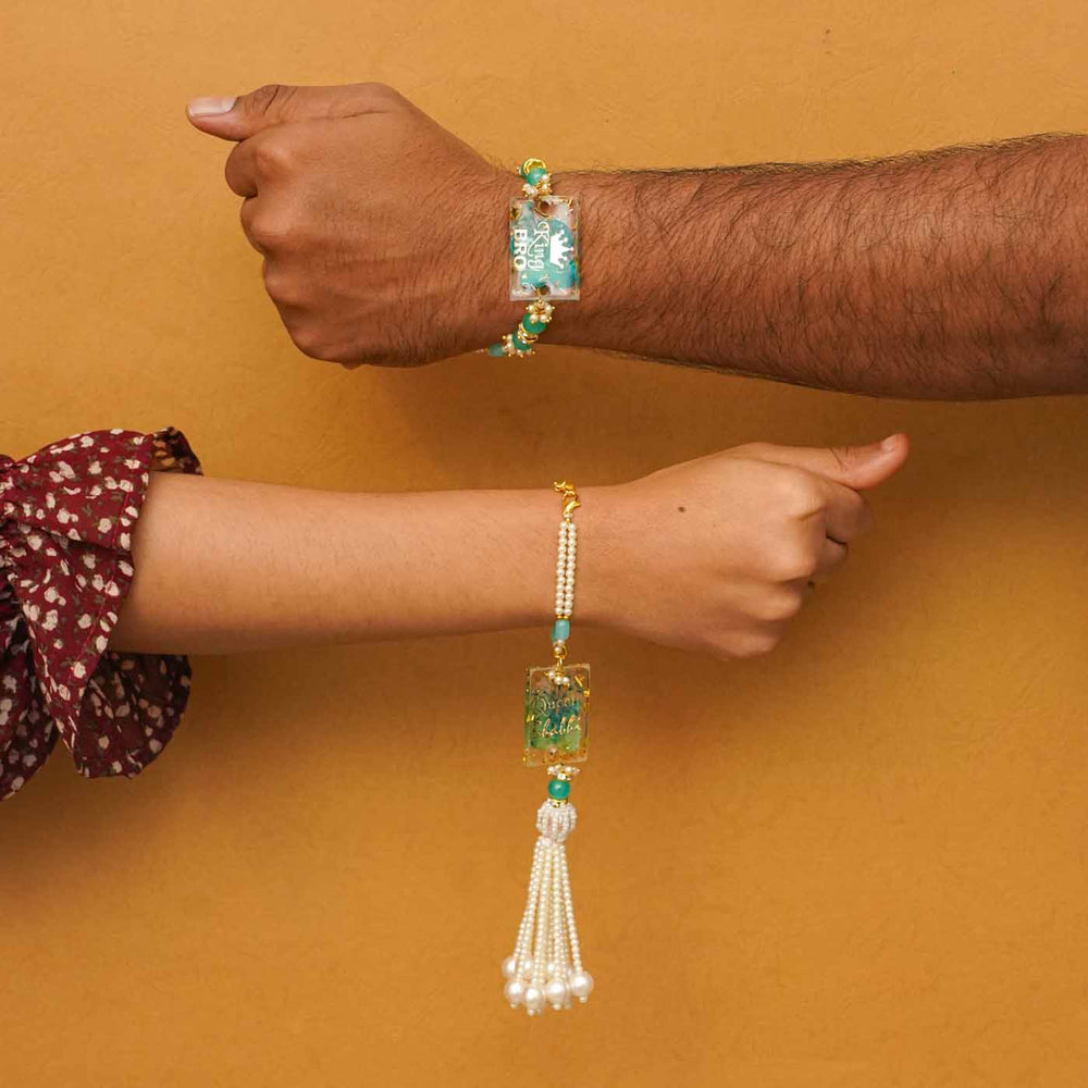 Handmade Resin Pyara Bhai And Pyari Bhabhi Rakhi With Chocolates And Roli Chawal Set Of 2 - Worn on Wrists Showing Fit