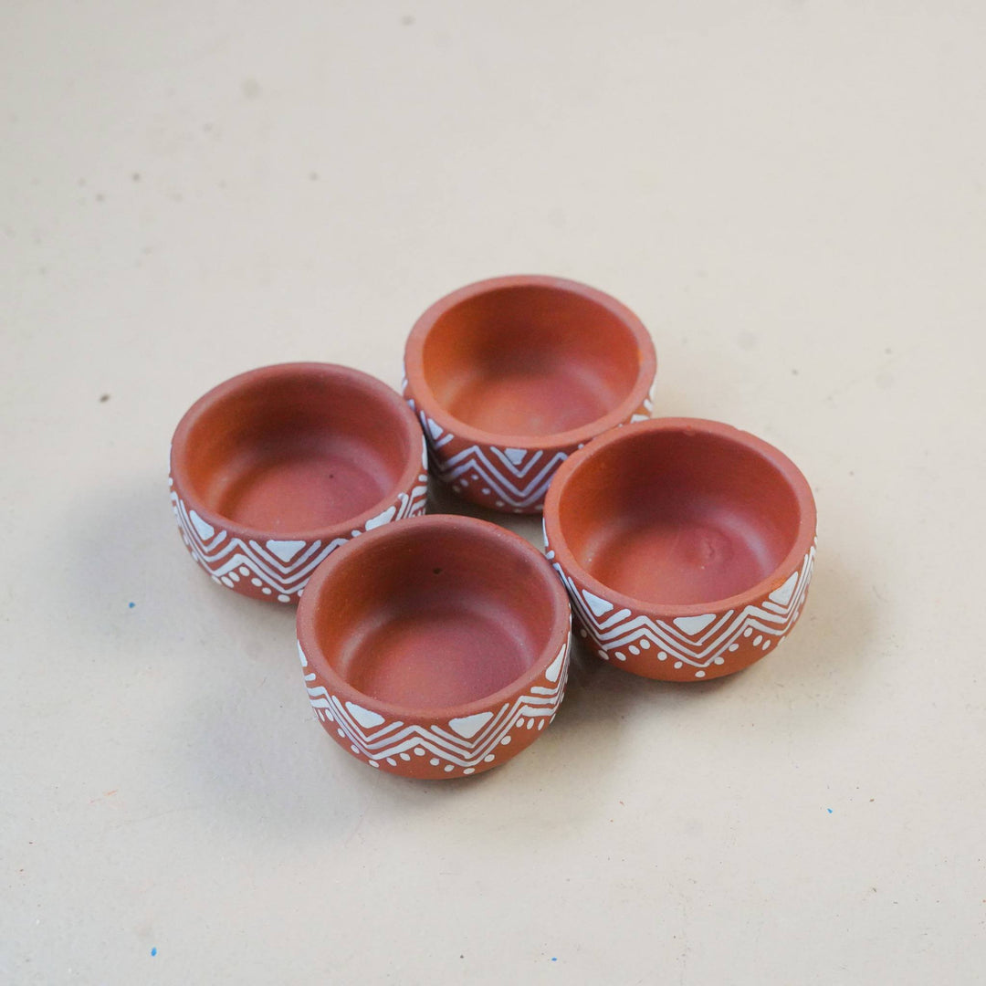16 Pc | Hand-Painted Warli-Inspired Terracotta Diya & Tealight Holders For Festive Decor