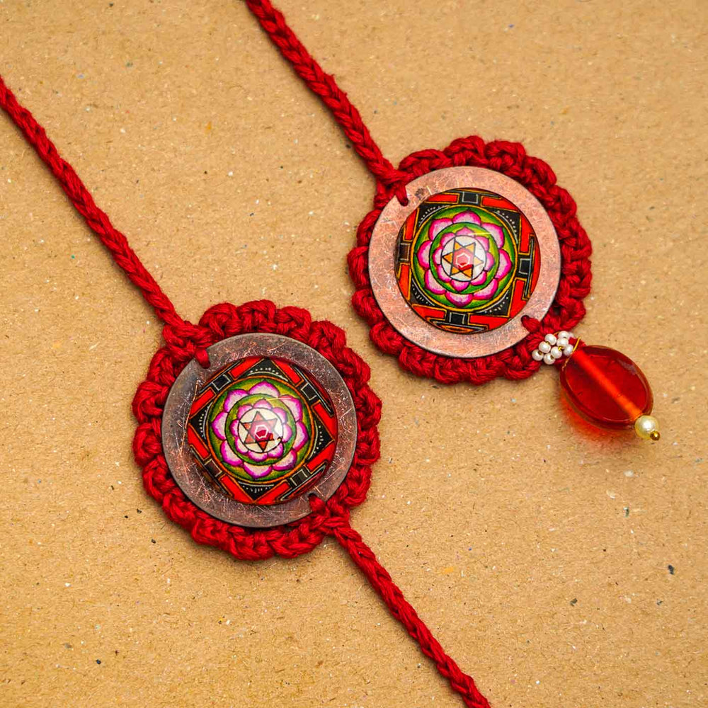 Handmade Crochet Mandala Cotton Rakhi Hamper For Bhaiya And Bhabhi Set Of 7 - Close-up on Red Rakhis