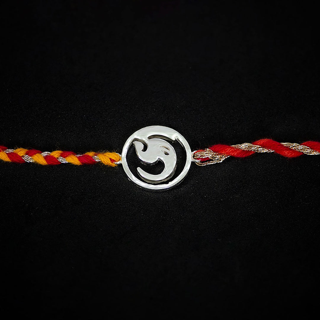 Handmade Deva 925 Silver Rakhi With Roli Chawal For Brother - Center Emblem Close-up