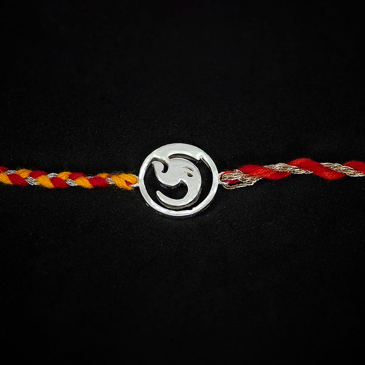 Handmade Deva 925 Silver Rakhi With Roli Chawal For Brother - Center Emblem Close-up