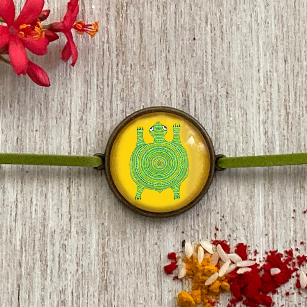Handcrafted Folk Art Rakhi Hamper For Toddlers With Rice Roli Haldi 2 - Close-up of rakhi design