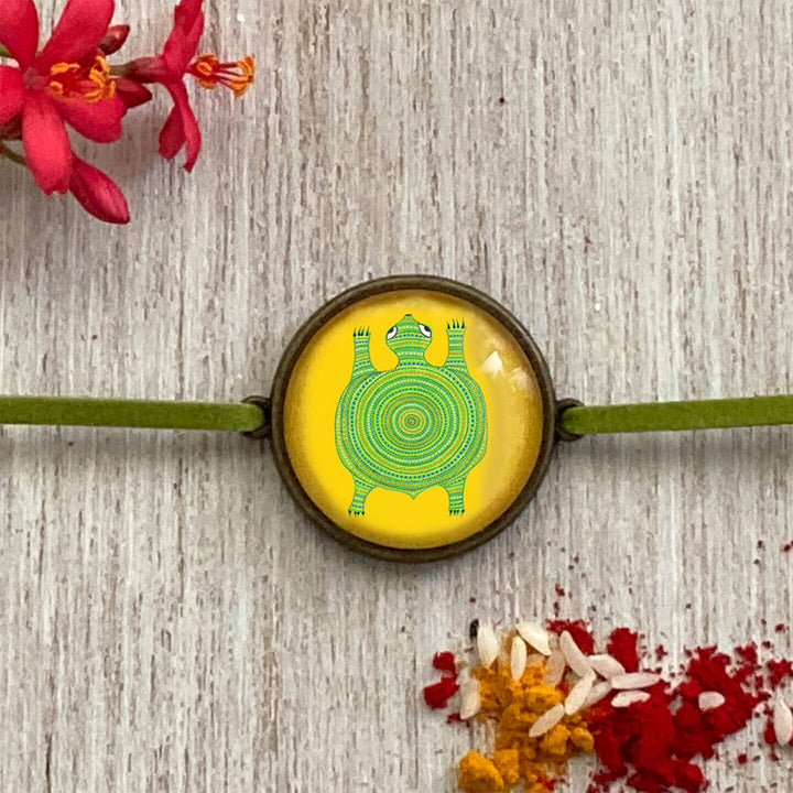 Handcrafted Folk Art Rakhi Hamper For Toddlers With Rice Roli Haldi 2 - Close-up of rakhi design